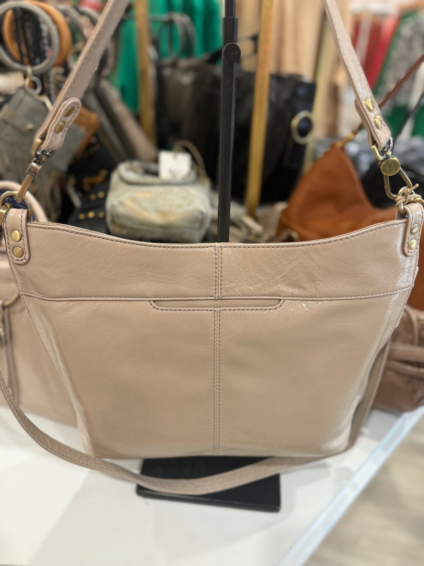 Hobo Pier Shoulder Bag in Stone Gloss or or Whiskey
